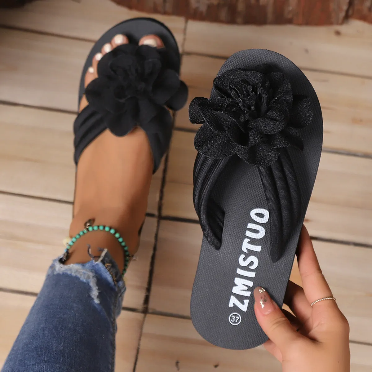 Women's solid colour PU upper flower flat toe flip-flop sandal in beige white, side view