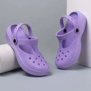 Women's EVA non-slip platform slippers in solid colour with cartoon flower design, available in pink