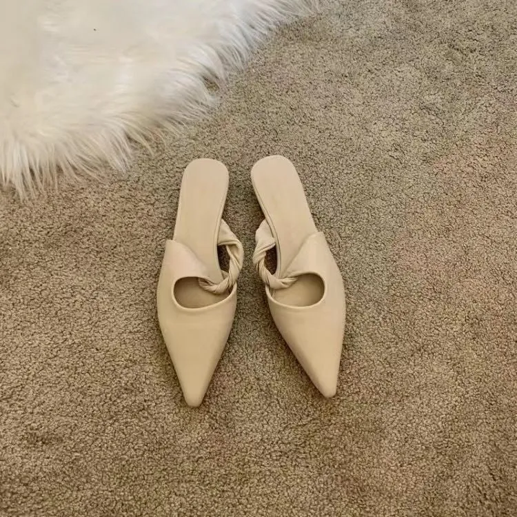 Women's soft leather slippers with a semi-toe box design in dark brown colour