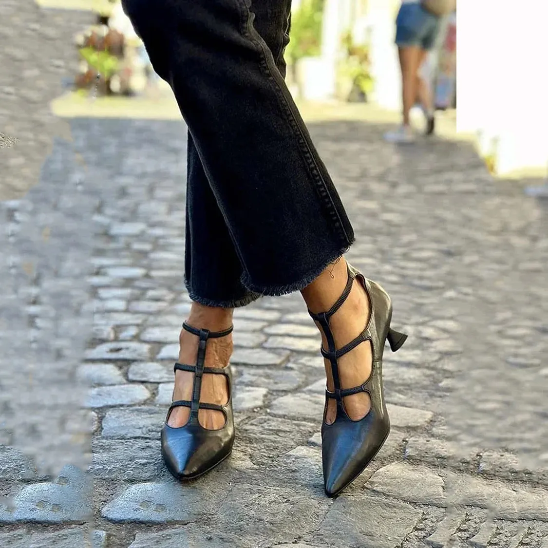 Women's plus size sandals with PU upper and buckle fastening in black, side view