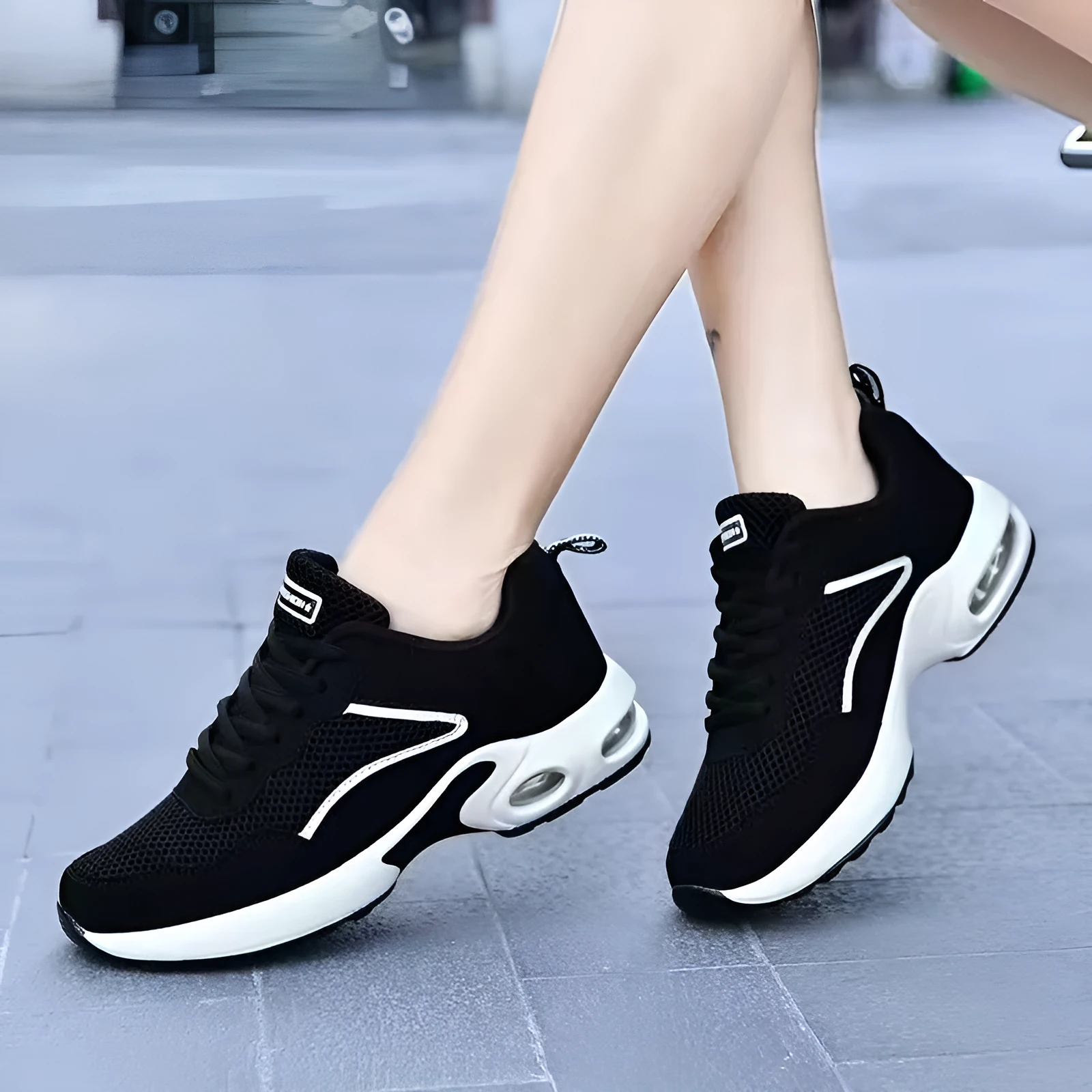 Breathable mesh low-top casual sneaker for elderly with flat heel and shallow mouth in black and white and black and red colour options