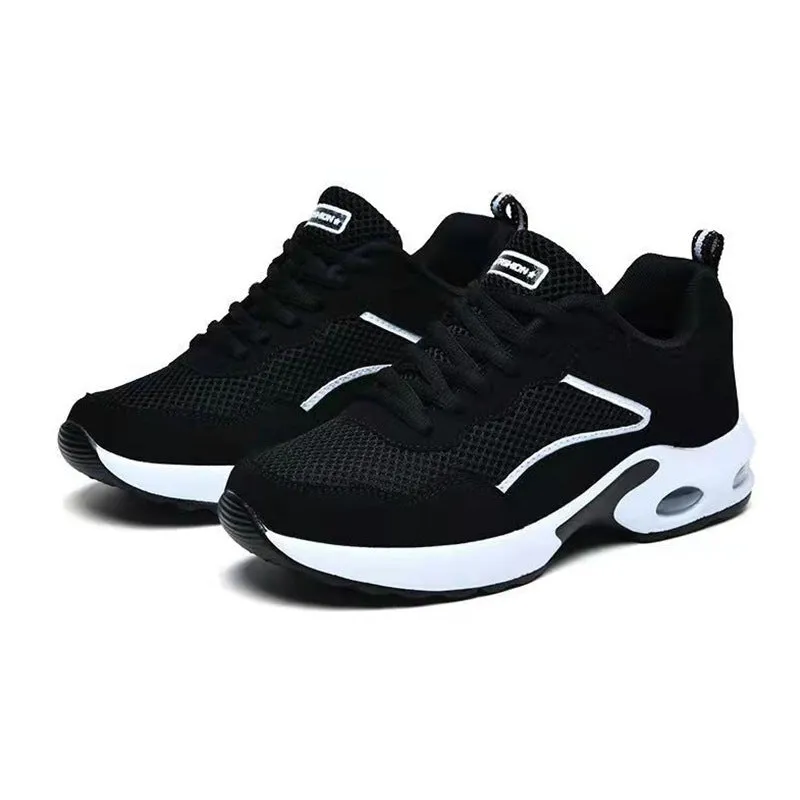 Breathable mesh low-top casual sneaker for elderly with flat heel and shallow mouth in black and white and black and red colour options