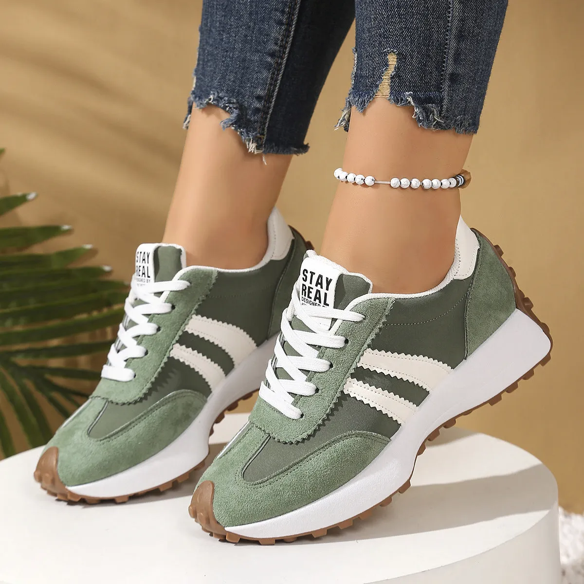Women's thick bottom breathable casual sneakers in black with PU upper and flat heel