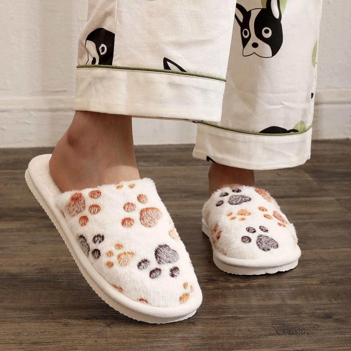 Women's cartoon print velvet cotton slippers in white with a toe holder design, shown on a plain background
