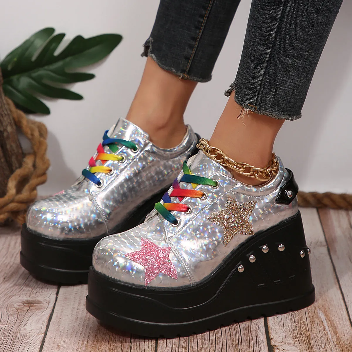 White punk platform shoes with shiny PU upper, rivet detailing, round toe, and thick sole
