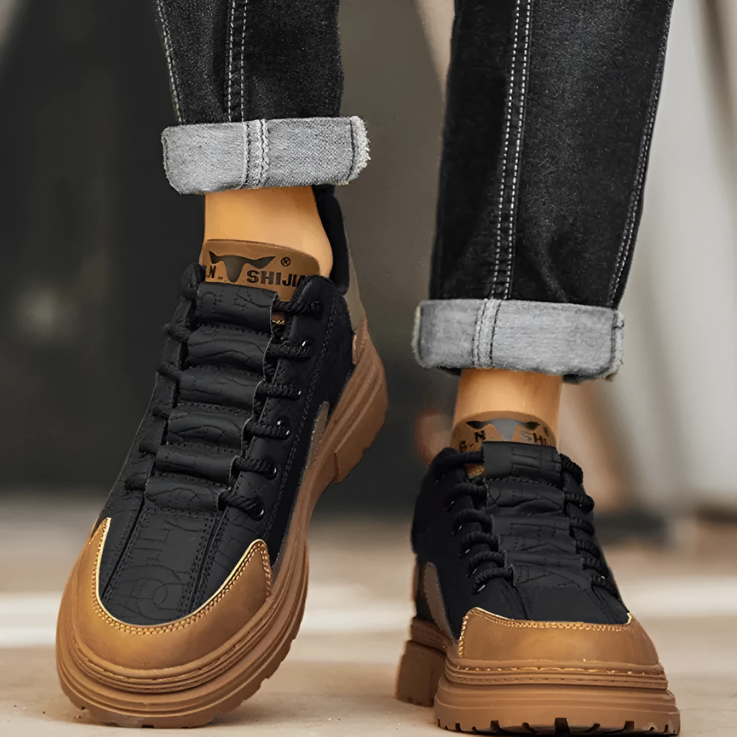 Black and white platform sneakers with thick rubber sole and microfiber leather insole.