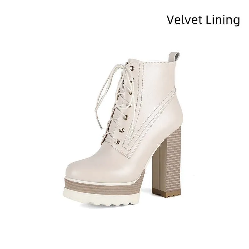 Women's black chunky heel waterproof platform ankle boots with side zip on a white background
