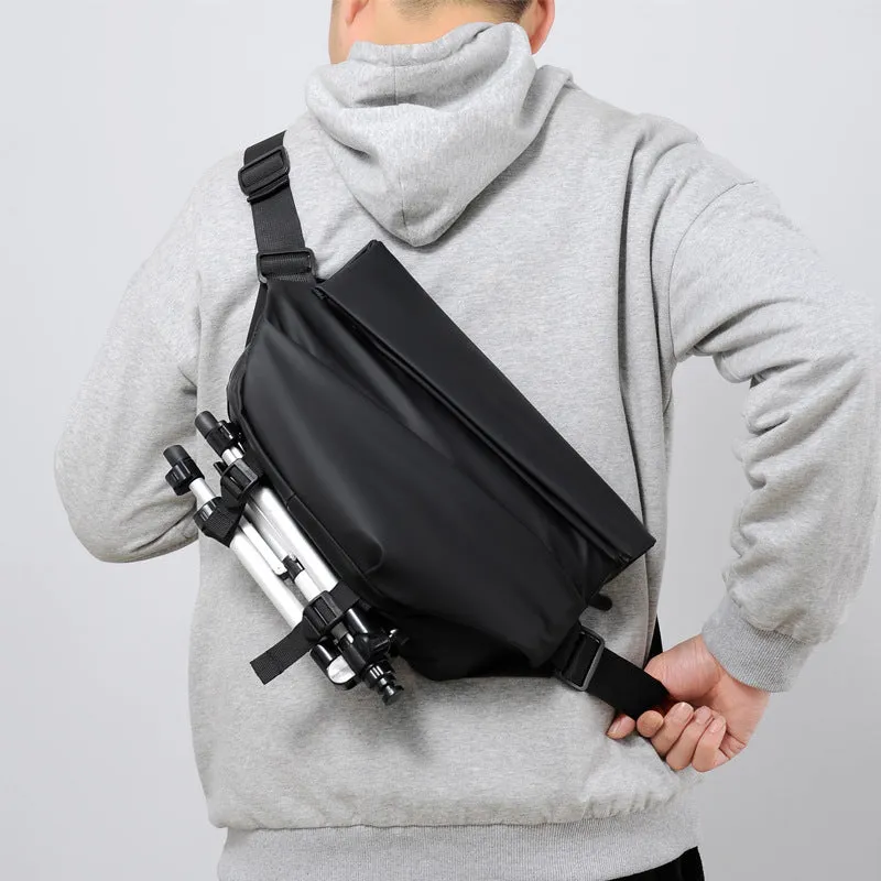 Grey men's medium square crossbody bag made of PU with a single shoulder strap and soft handle.