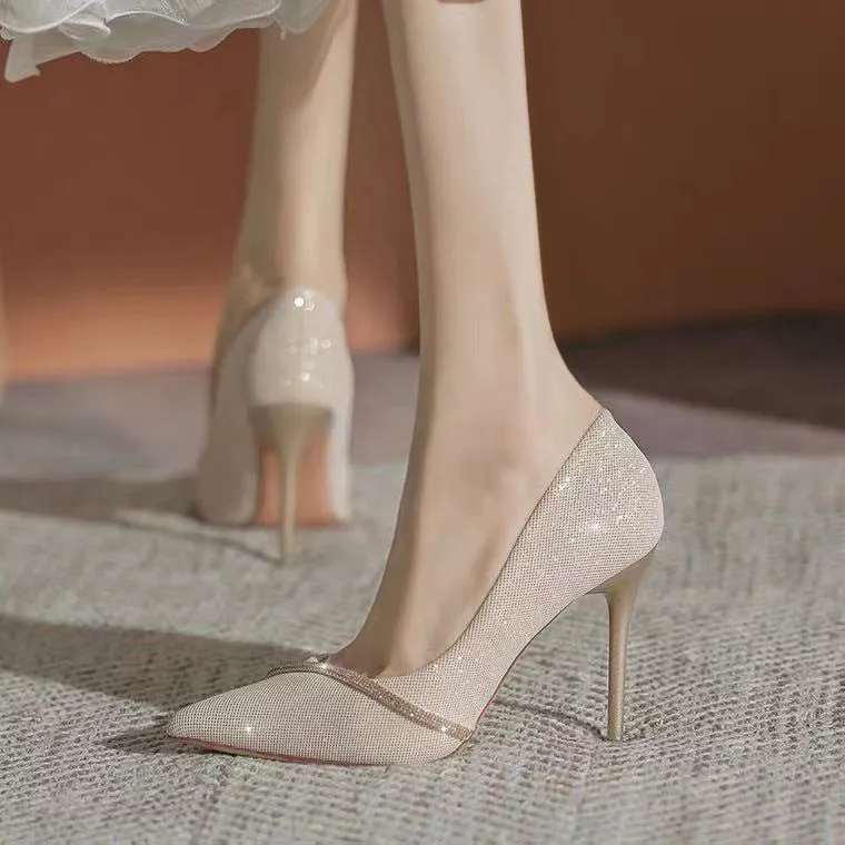Women's gold and black pointed toe stiletto heels with 6cm and 9cm heel height options