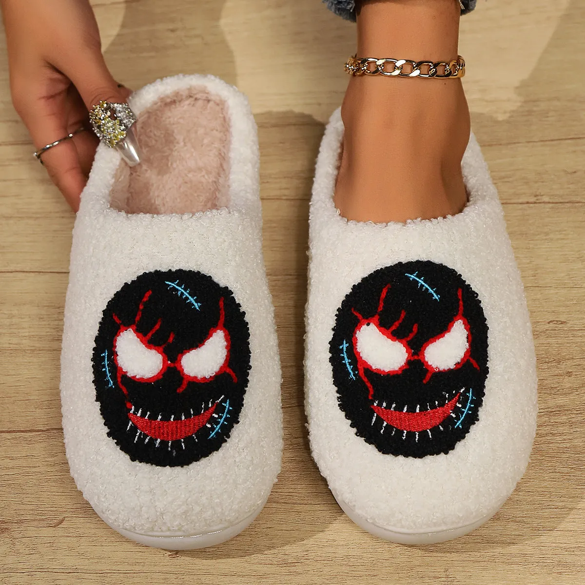 Women's indoor plush thermal cotton slippers with linen upper, non-slip sole, colour Mask Black, on a light indoor floor