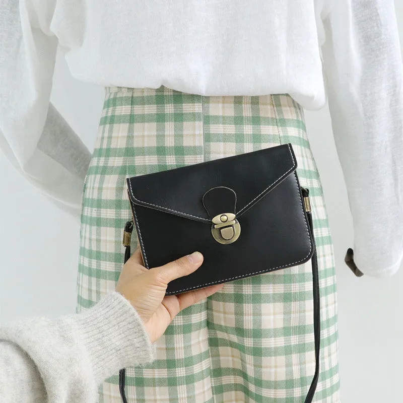 Retro shoulder messenger bag in wine red with flap closure and crossbody strap