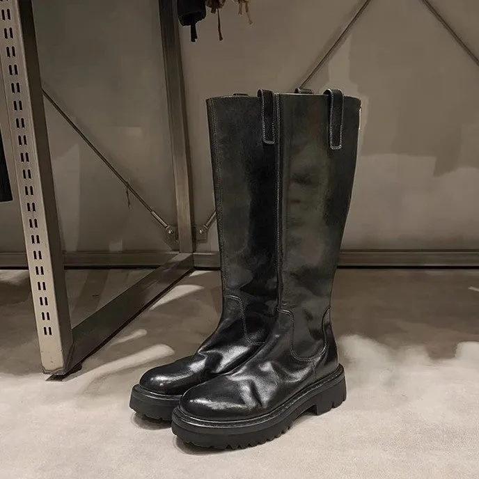 Black round toe knight boots with chunky heel, high tube design, and a back zipper.