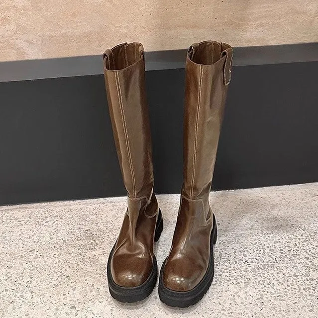 Black round toe knight boots with chunky heel, high tube design, and a back zipper.