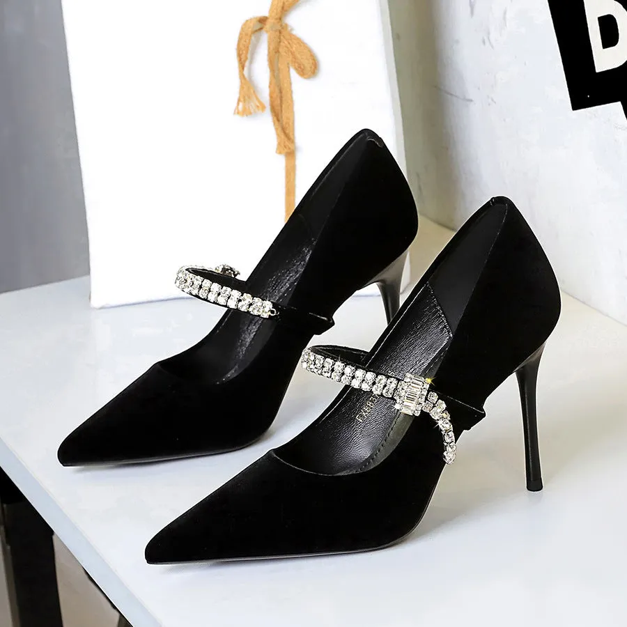 Pointed toe suede stiletto heels with rhinestone strap in black, shallow vamp design