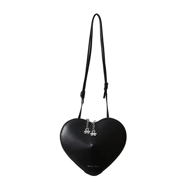 Women's PU leather heart shape crossbody bag in milky white with sewing line design and single shoulder strap