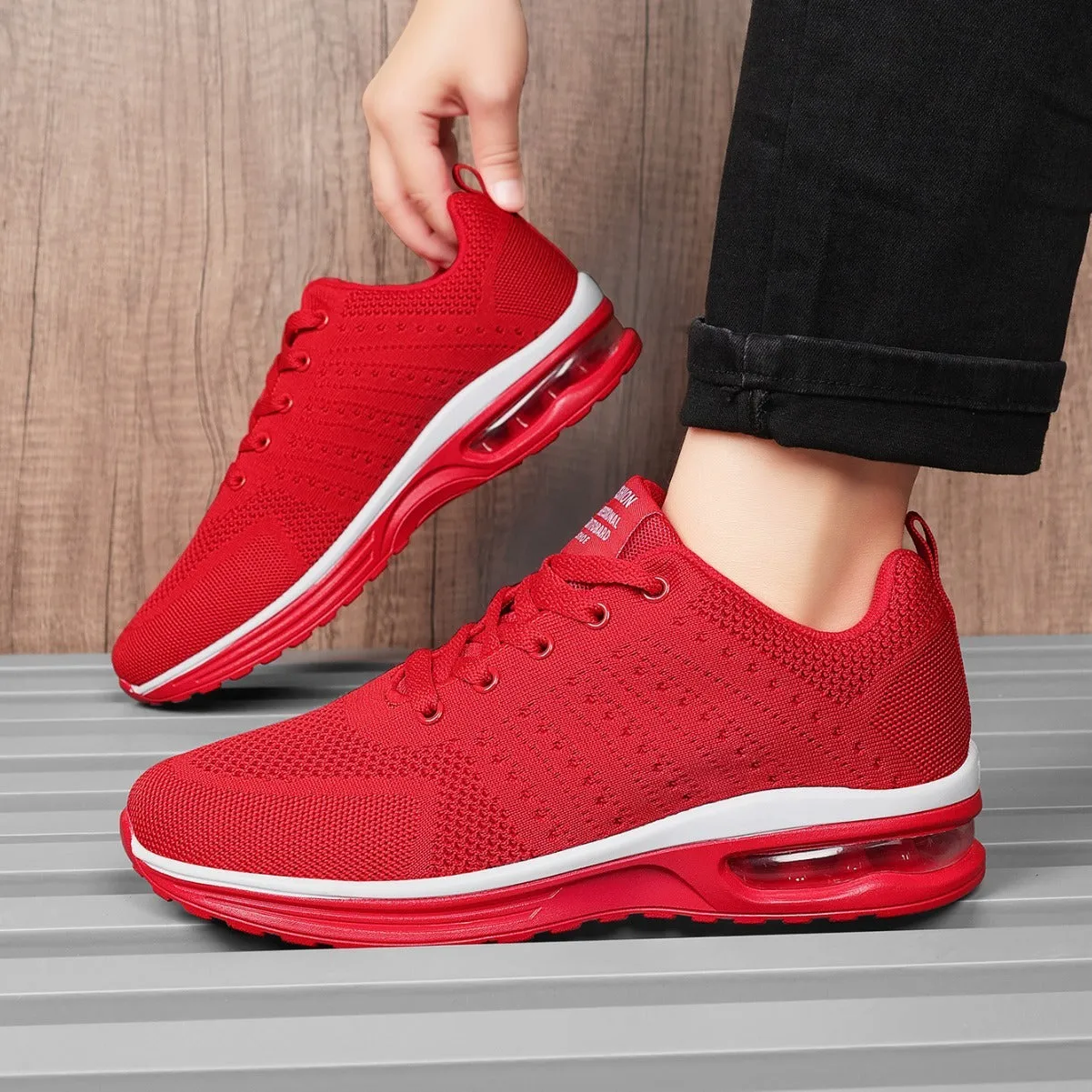 Casual Flyknit running shoes in multiple colours showing mesh upper and PU sole.