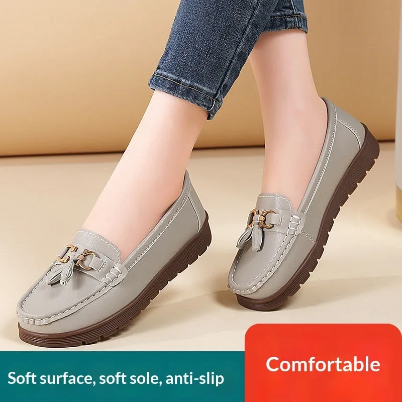 Women's plus size flat moccasins loafers with tassels, round toe, low wedge heel, solid colour suede upper, slip-on style in beige, gray, and pink