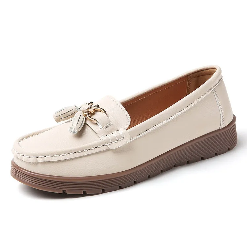 Women's plus size flat moccasins loafers with tassels, round toe, low wedge heel, solid colour suede upper, slip-on style in beige, gray, and pink