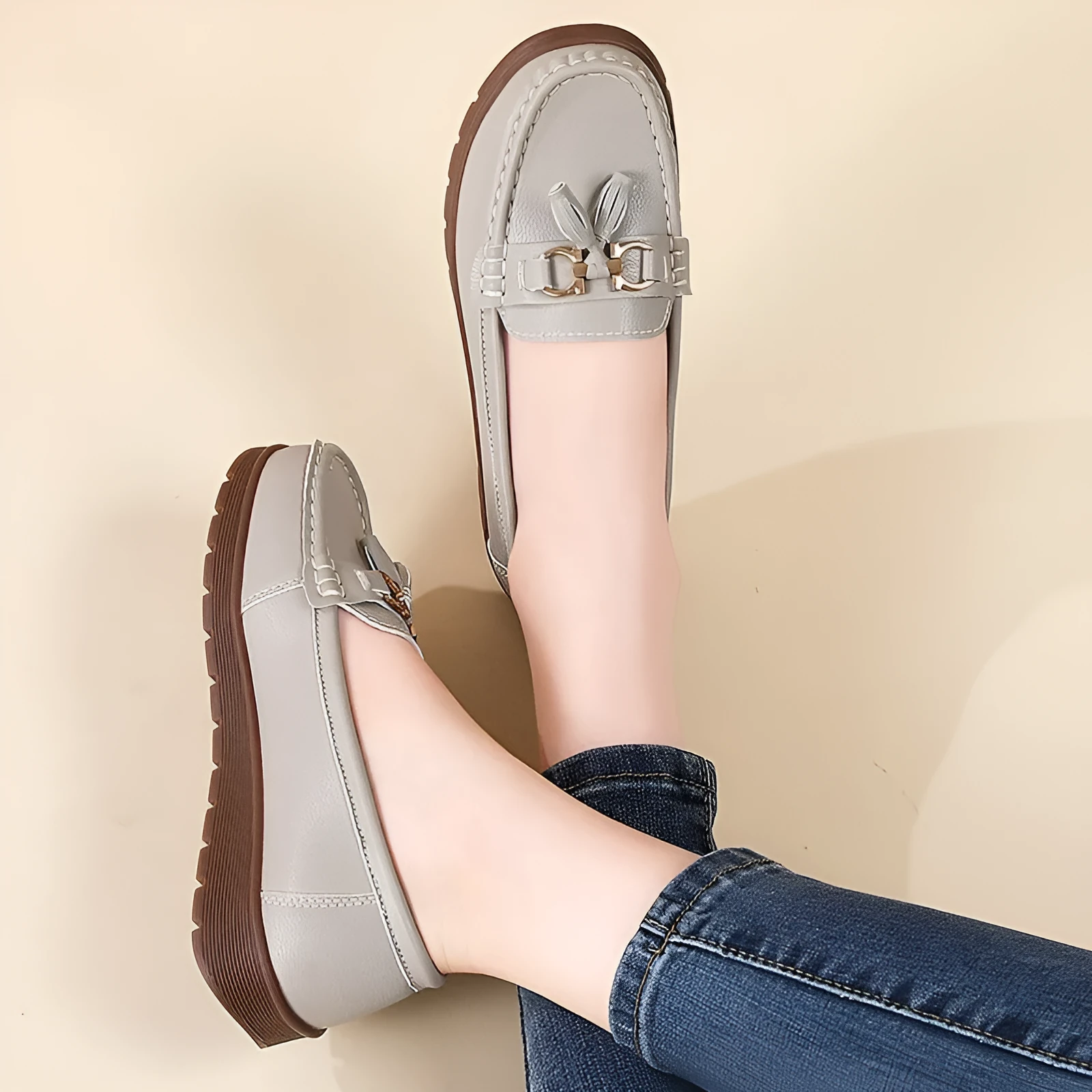 Women's plus size flat moccasins loafers with tassels, round toe, low wedge heel, solid colour suede upper, slip-on style in beige, gray, and pink
