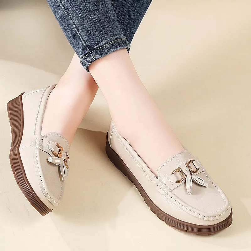 Women's plus size flat moccasins loafers with tassels, round toe, low wedge heel, solid colour suede upper, slip-on style in beige, gray, and pink