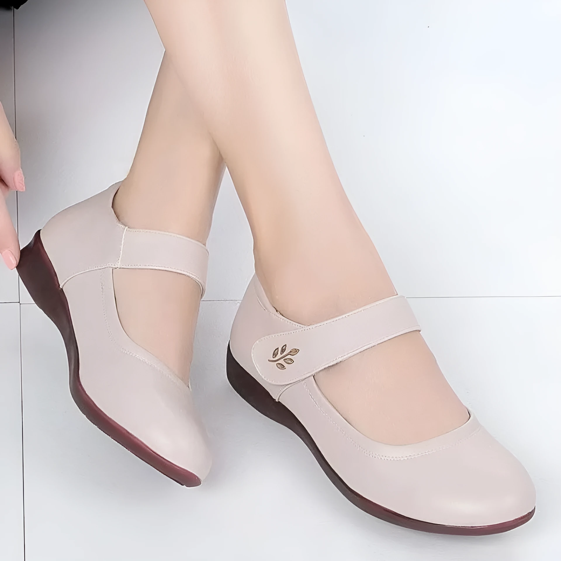 Women's softsoled peeptoe leather shoes with single strap, wedge heel, round toe, black and off-white options