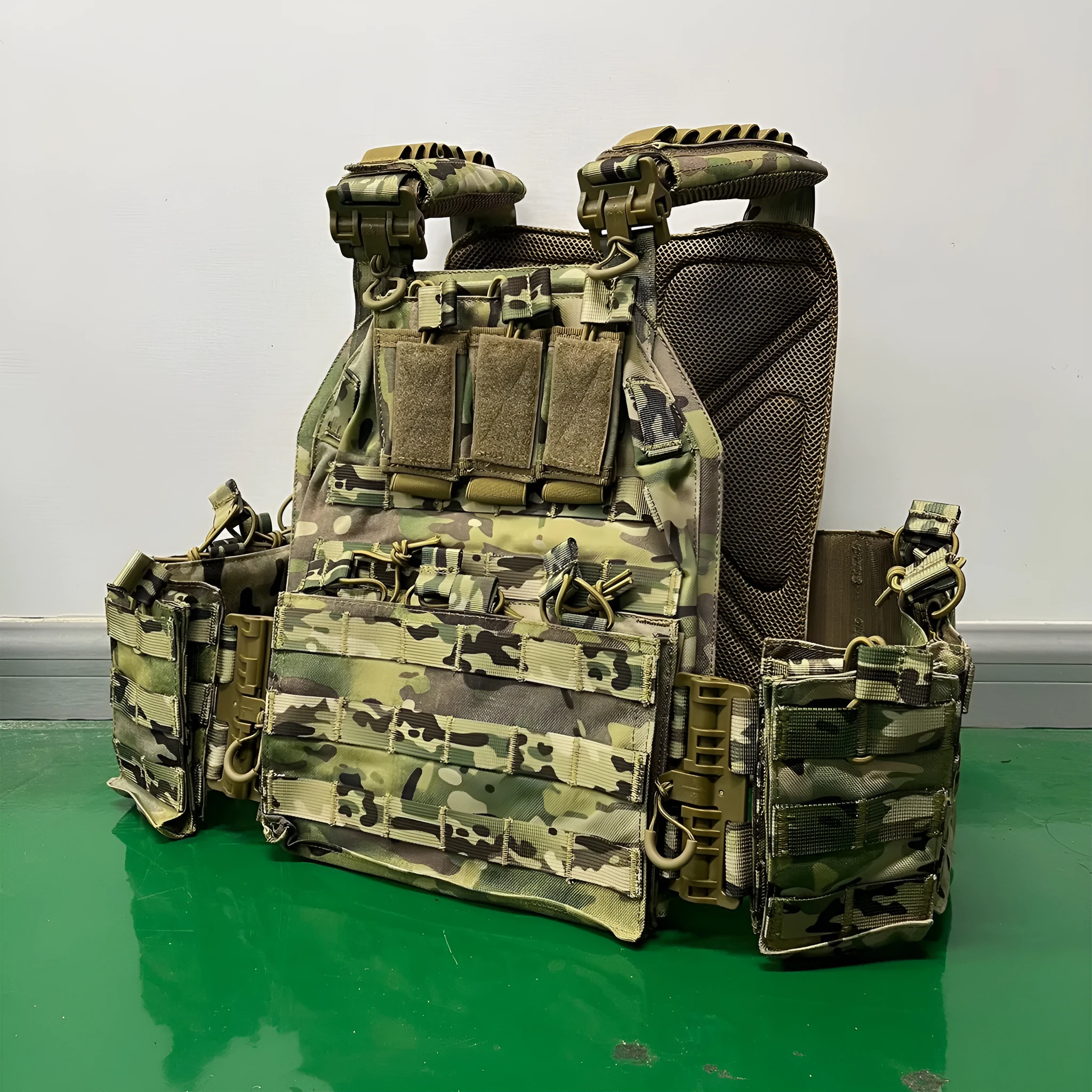 Solid colour Oxford cloth tactical vest in army green shown front view for outdoor use