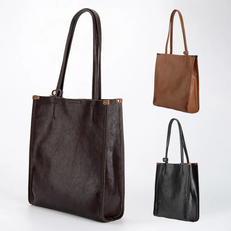 Large capacity genuine leather city commuter shoulder tote bag in black, soft square vertical shape with slit pocket