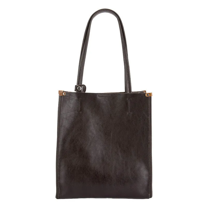Large capacity genuine leather city commuter shoulder tote bag in black, soft square vertical shape with slit pocket