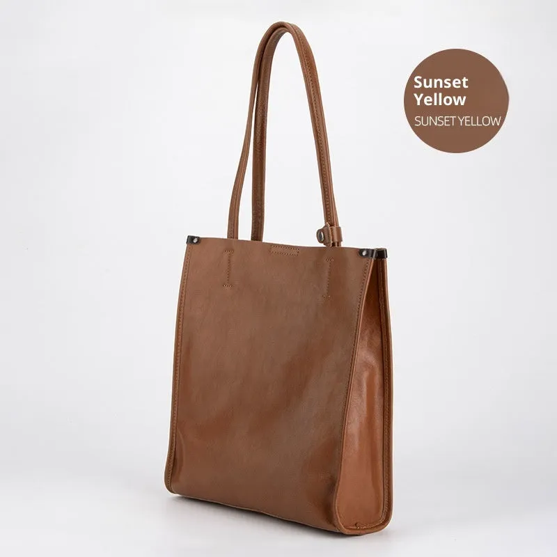 Large capacity genuine leather city commuter shoulder tote bag in black, soft square vertical shape with slit pocket