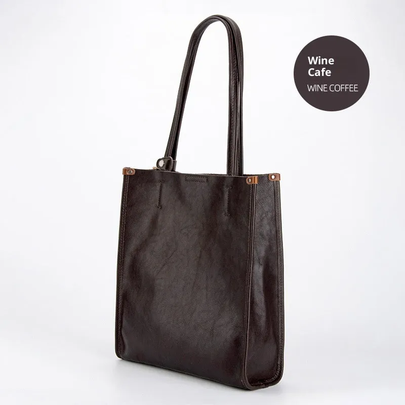 Large capacity genuine leather city commuter shoulder tote bag in black, soft square vertical shape with slit pocket