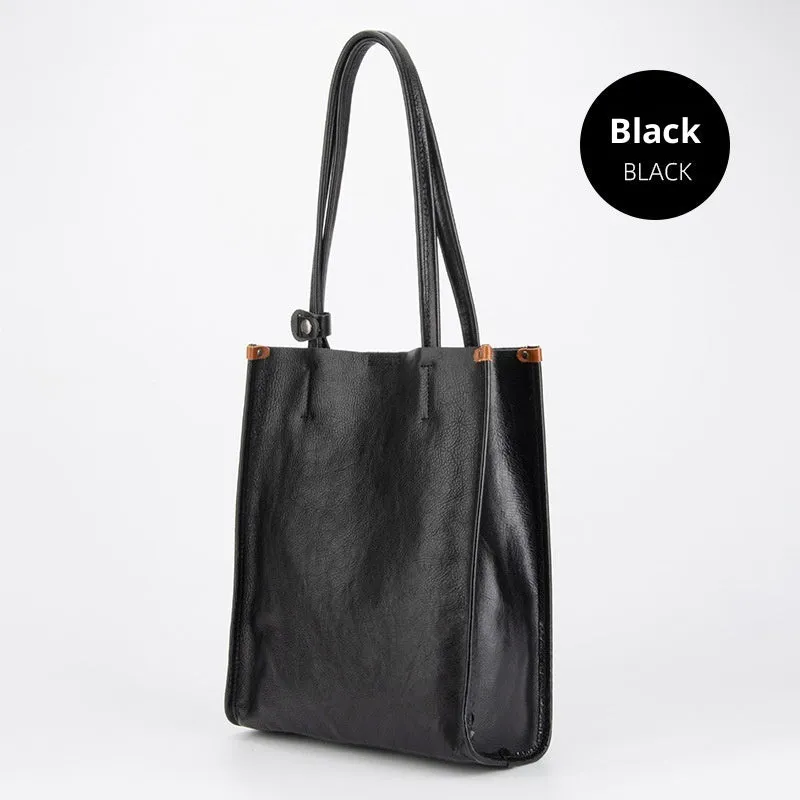 Large capacity genuine leather city commuter shoulder tote bag in black, soft square vertical shape with slit pocket