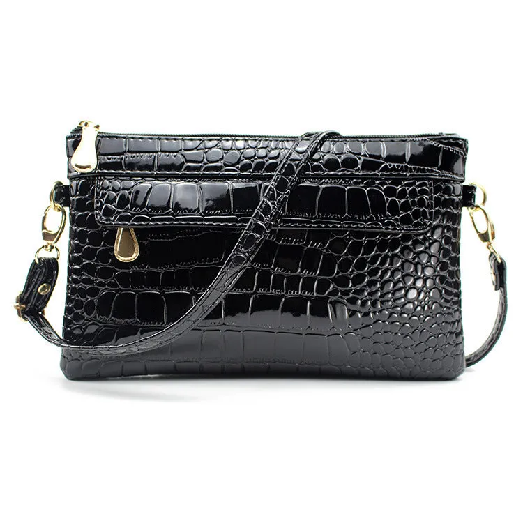 Women's black PU messenger shoulder bag with horizontal square shape showing 24cm width