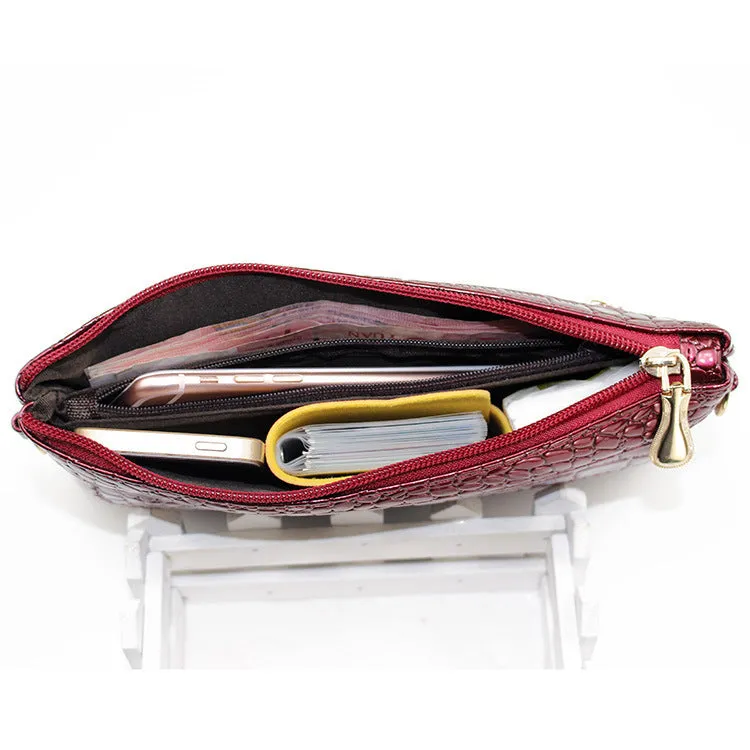 Women's black PU messenger shoulder bag with horizontal square shape showing 24cm width