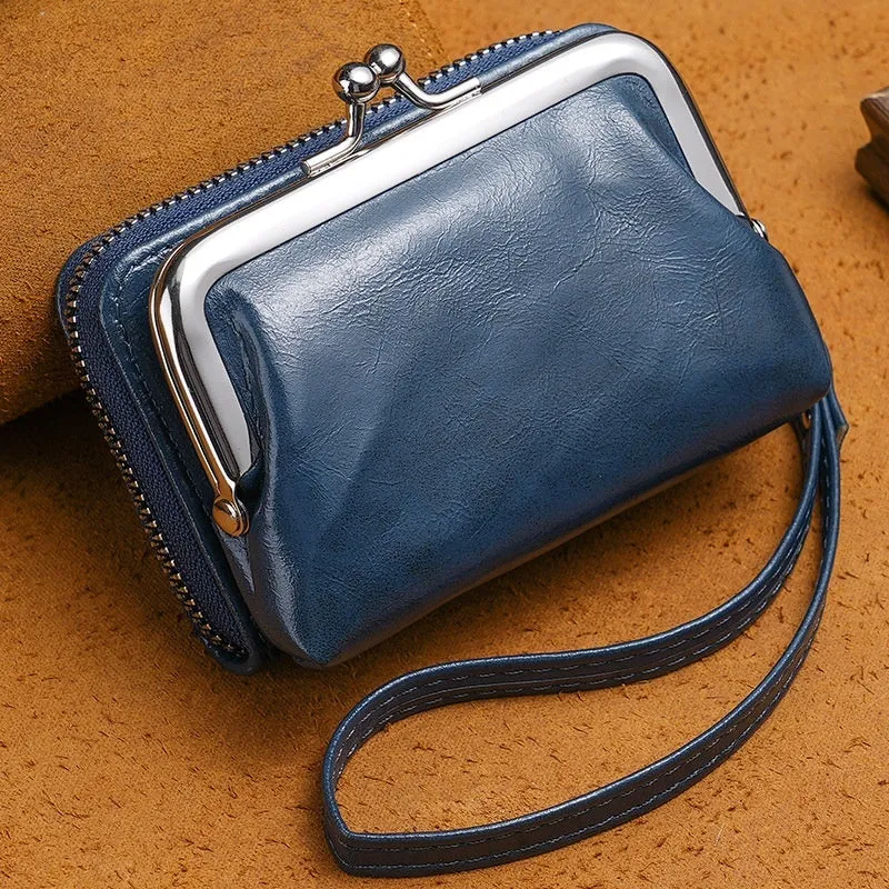 Round ladies coin purse with snap fastener and detachable metal clip, shown in assorted colours.
