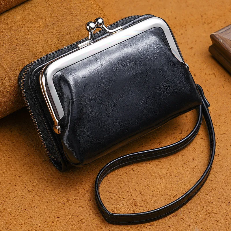 Round ladies coin purse with snap fastener and detachable metal clip, shown in assorted colours.