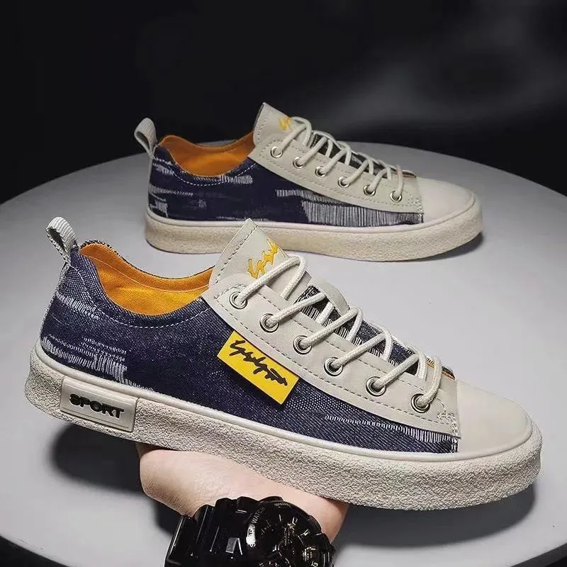 Men's dark blue casual canvas shoes with round toe and white rubber sole.