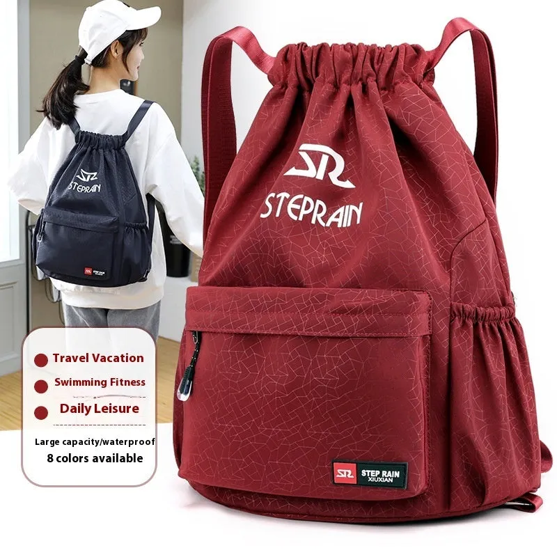 Lightweight drawstring backpack in Oxford cloth available in black, blue, pink and other colours