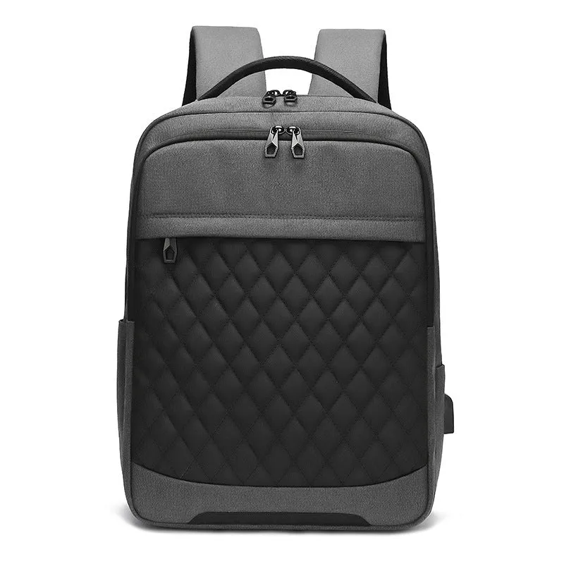 Men's solid colour Oxford cloth travel backpack with curved shoulder strap shown in black, blue, and grey.