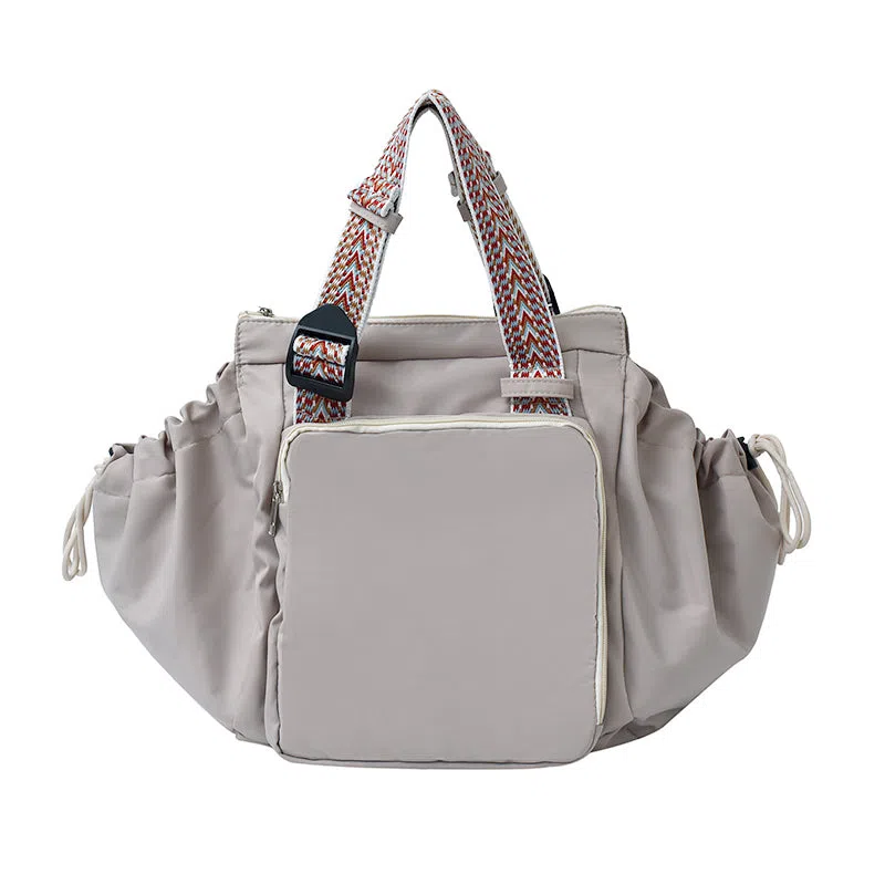 Nylon mommy bag in large capacity tote style, available in multiple colours for travel and daily use