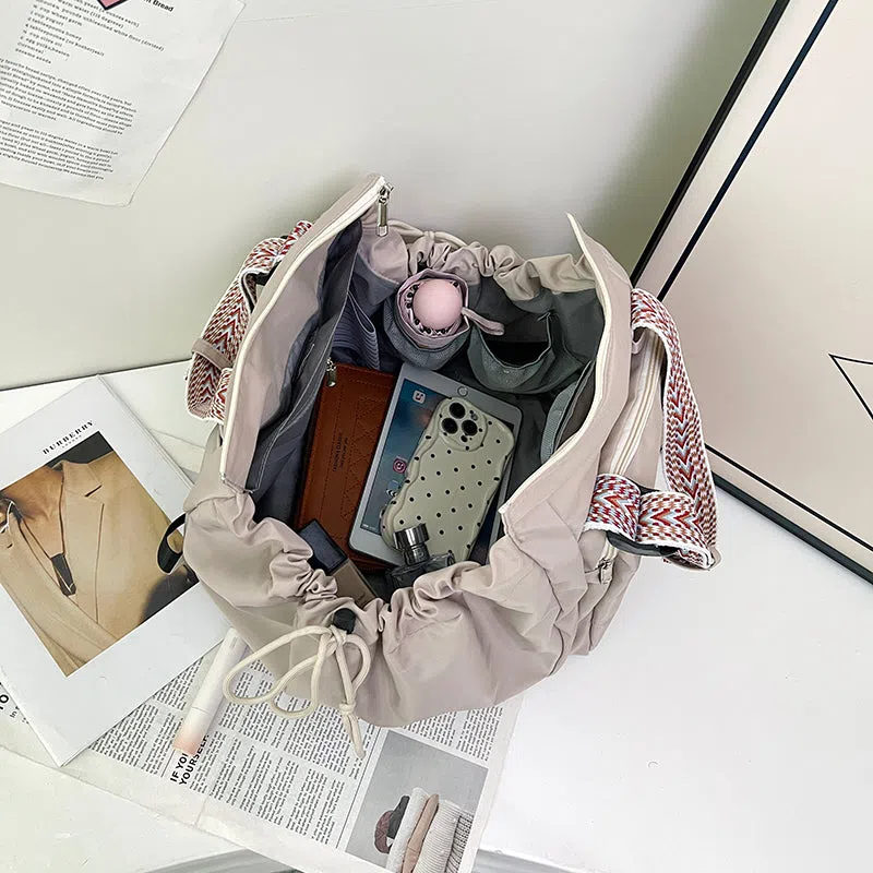 Nylon mommy bag in large capacity tote style, available in multiple colours for travel and daily use