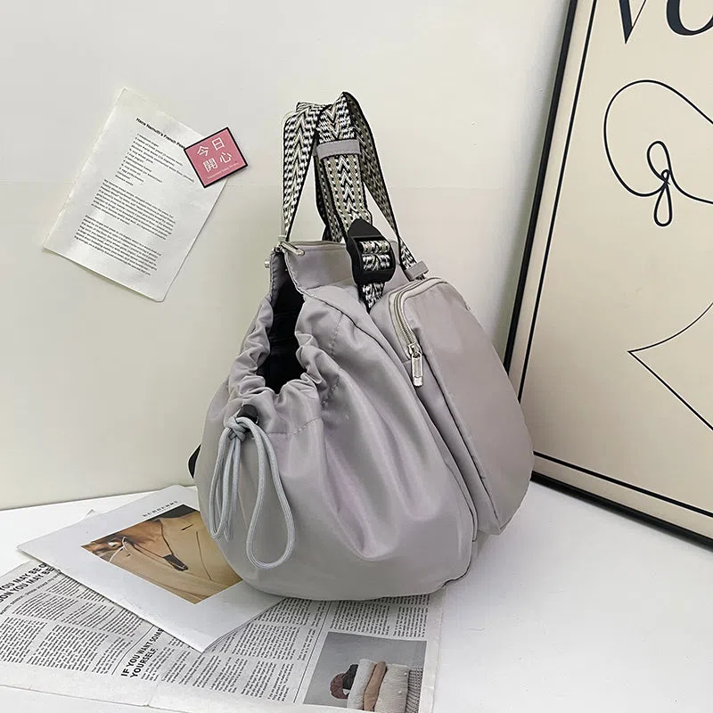 Nylon mommy bag in large capacity tote style, available in multiple colours for travel and daily use