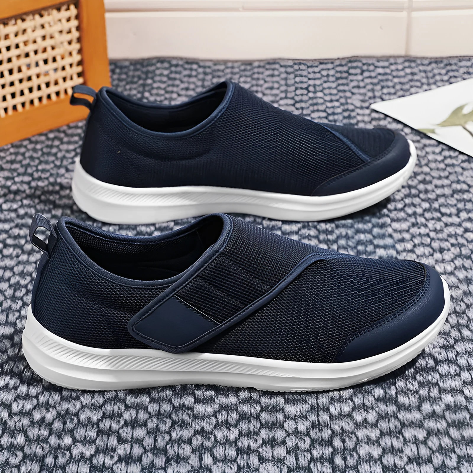 Velcro fastening walking shoes with mesh upper in black, available in sizes 36 to 47.