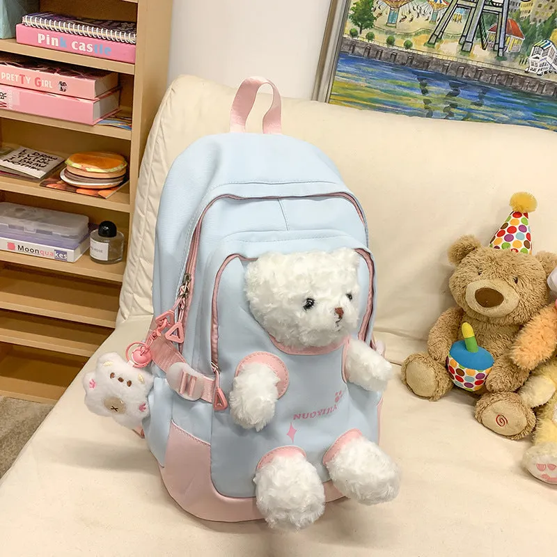 Nylon school backpack in macaron colours with curved shoulder straps and 20-35L capacity