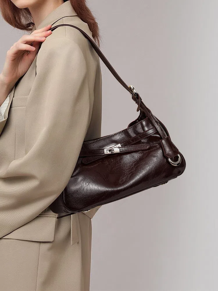 Genuine leather horizontal square crossbody bag with stitching and inner zippered compartment in brown