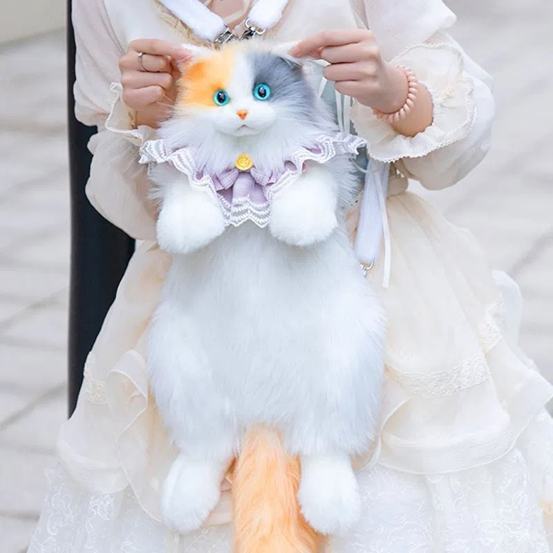 Simulation calico cat backpack plush with lace bell collar, front view, soft plush material
