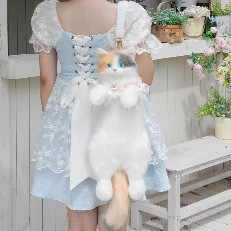 Simulation calico cat backpack plush with lace bell collar, front view, soft plush material