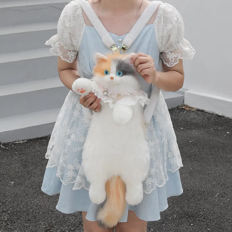 Simulation calico cat backpack plush with lace bell collar, front view, soft plush material