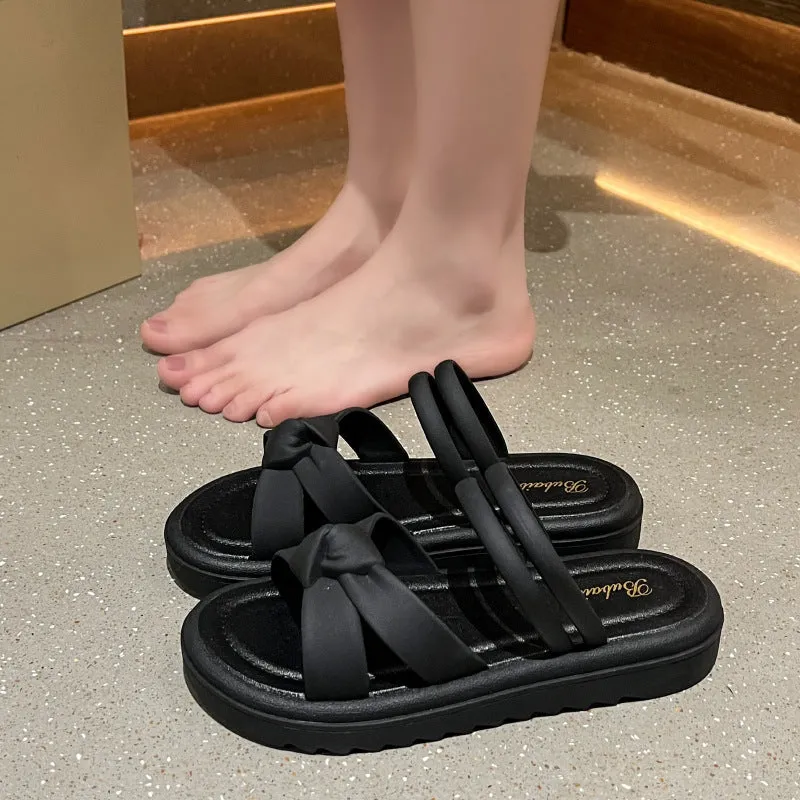 Women's black and white two-way wear sandals with soft thick back and non-slip PVC sole.