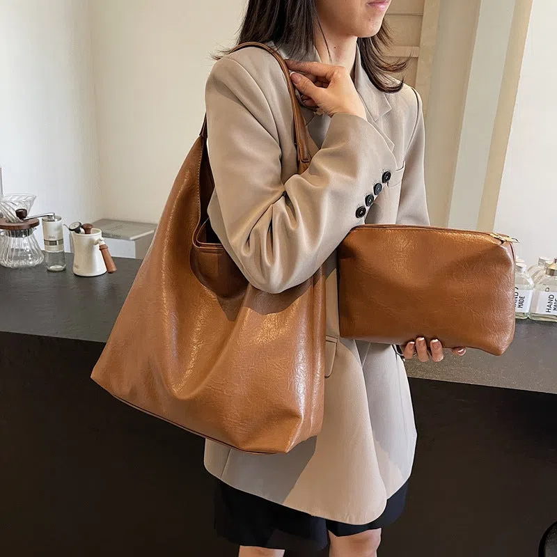 Women's soft PU single shoulder bucket bag in Coffee, Black, Brown, or Mud colour with phone pocket