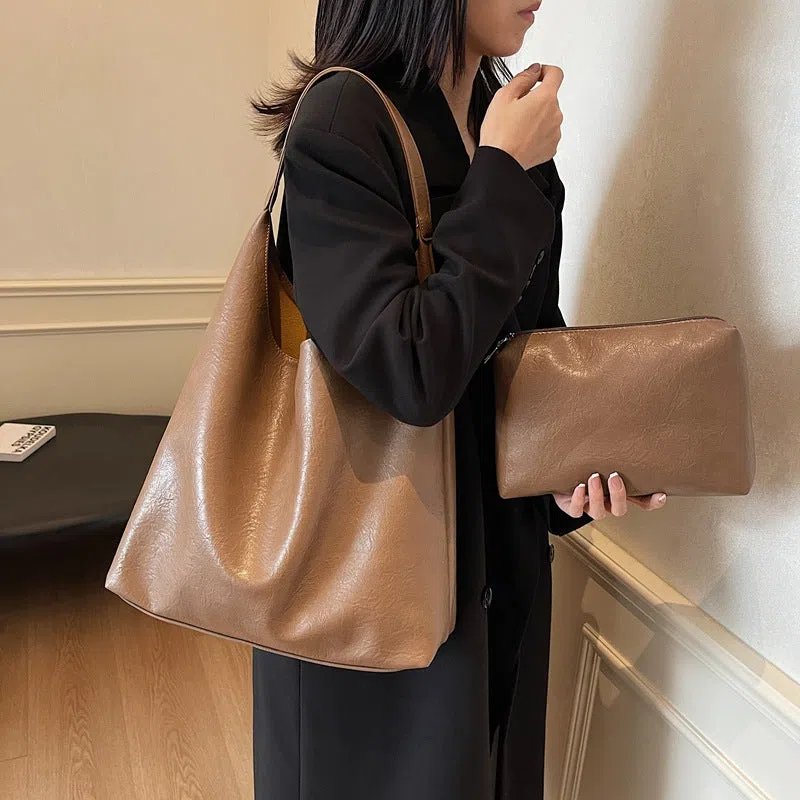 Women's soft PU single shoulder bucket bag in Coffee, Black, Brown, or Mud colour with phone pocket